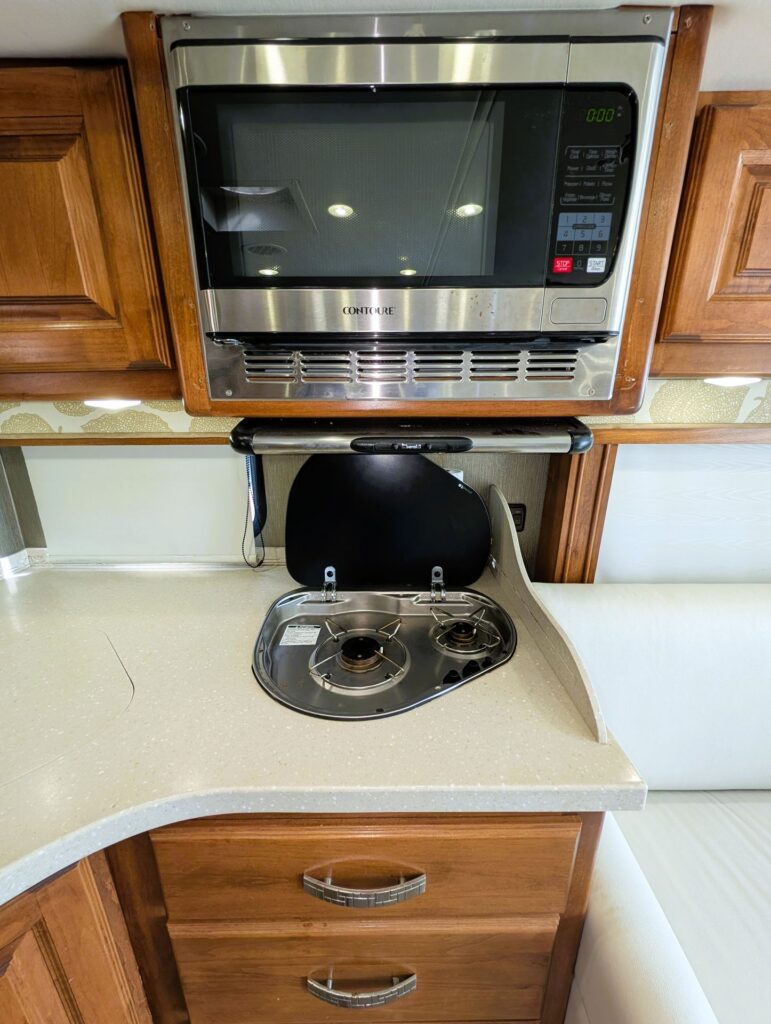 2013 Tiffin Allegro Breeze 32BR diesel pusher for sale – two burner cooktop